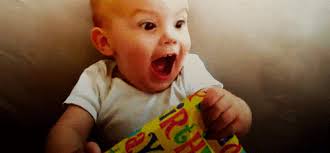 baby opening present excited gif